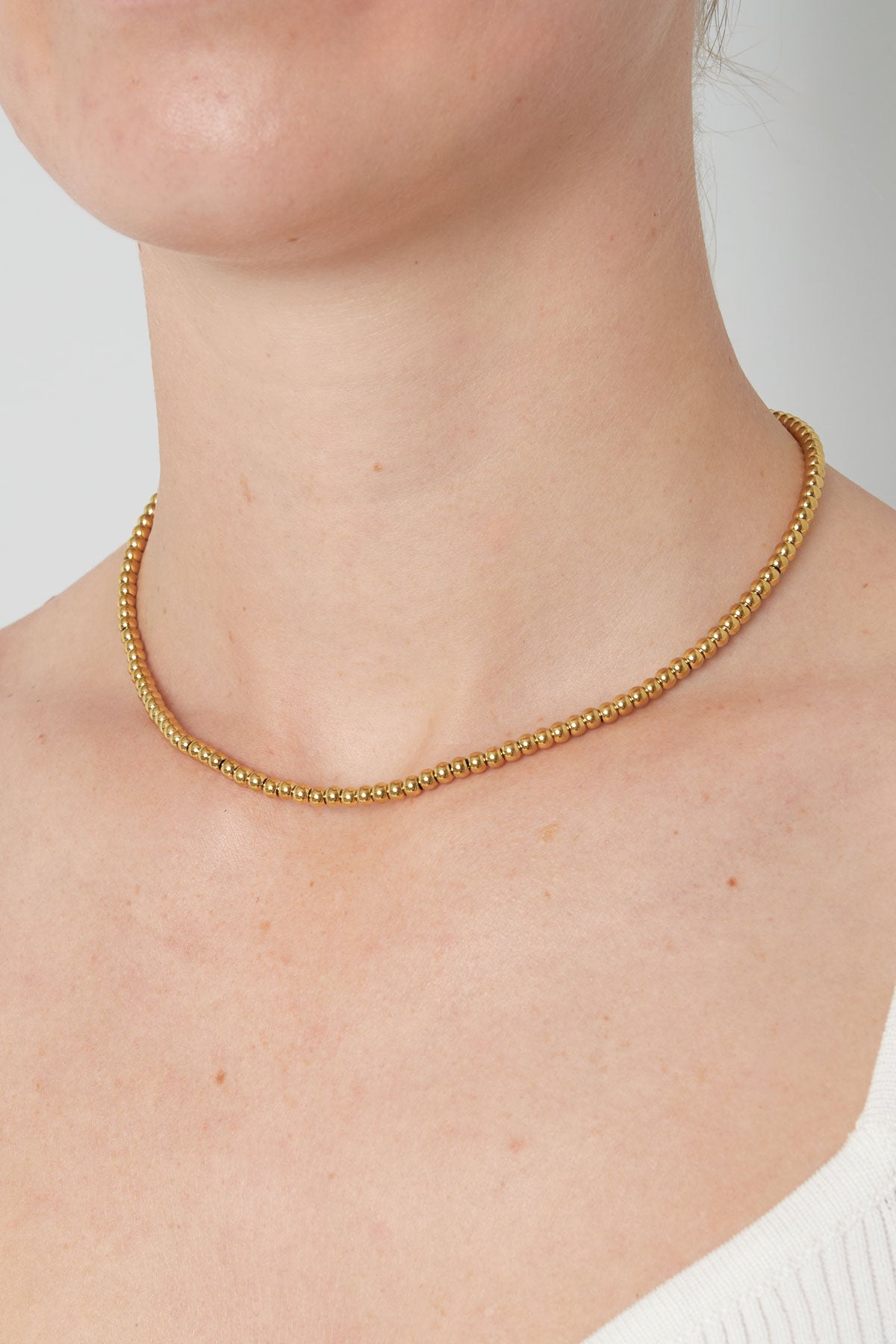 Bea - kralenketting Goud aan hals