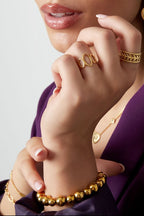Iconic - bandring Goud aan hand