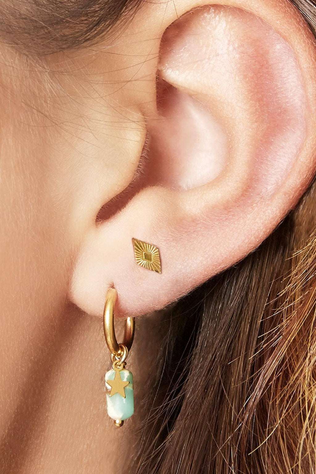 Mini - studs Zilver aan oor