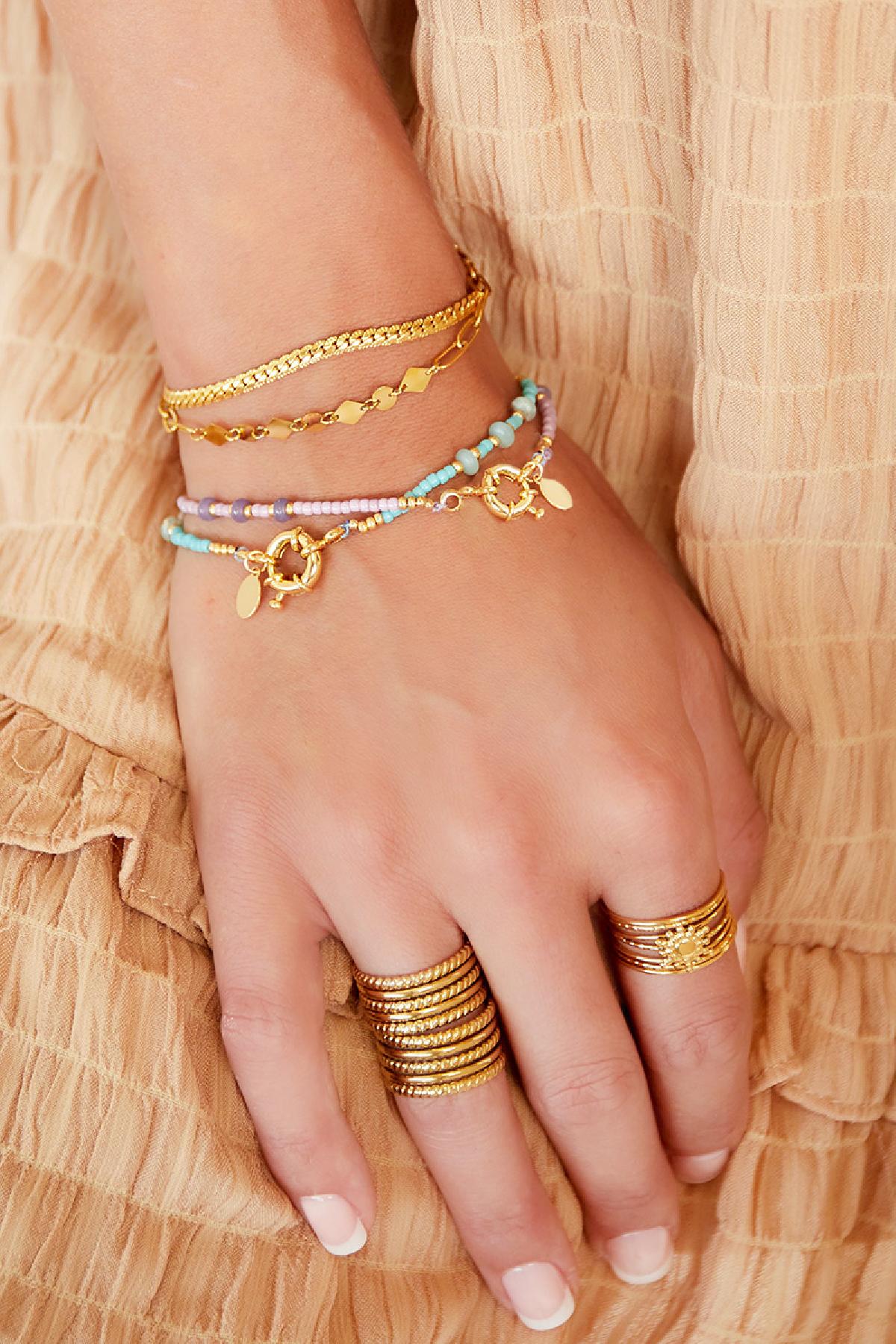 Lou - manchet armband Goud aan pols