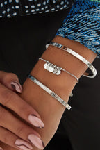 Soft Move - bedelarmband Goud aan pols