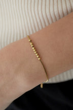 Daylight - bedelarmband Goud aan pols