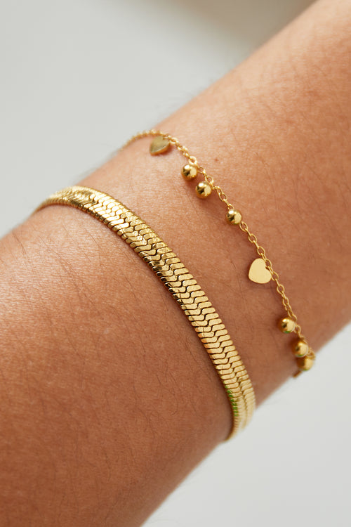 Line - schakelarmband Goud aan pols