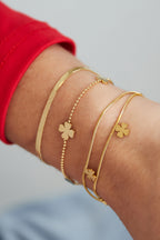Marja - bedelarmband Goud aan pols