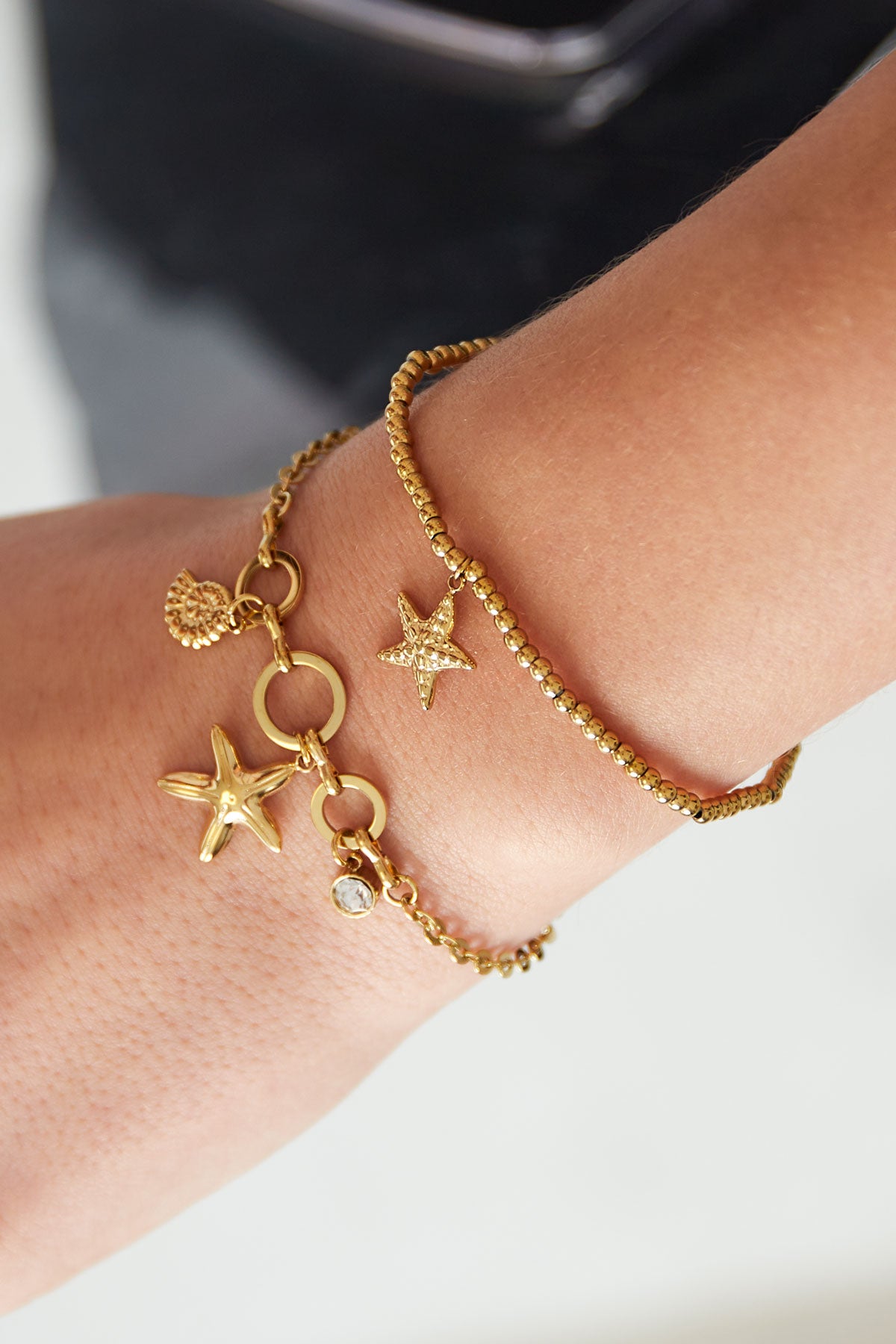 Saya - armband Goud aan pols