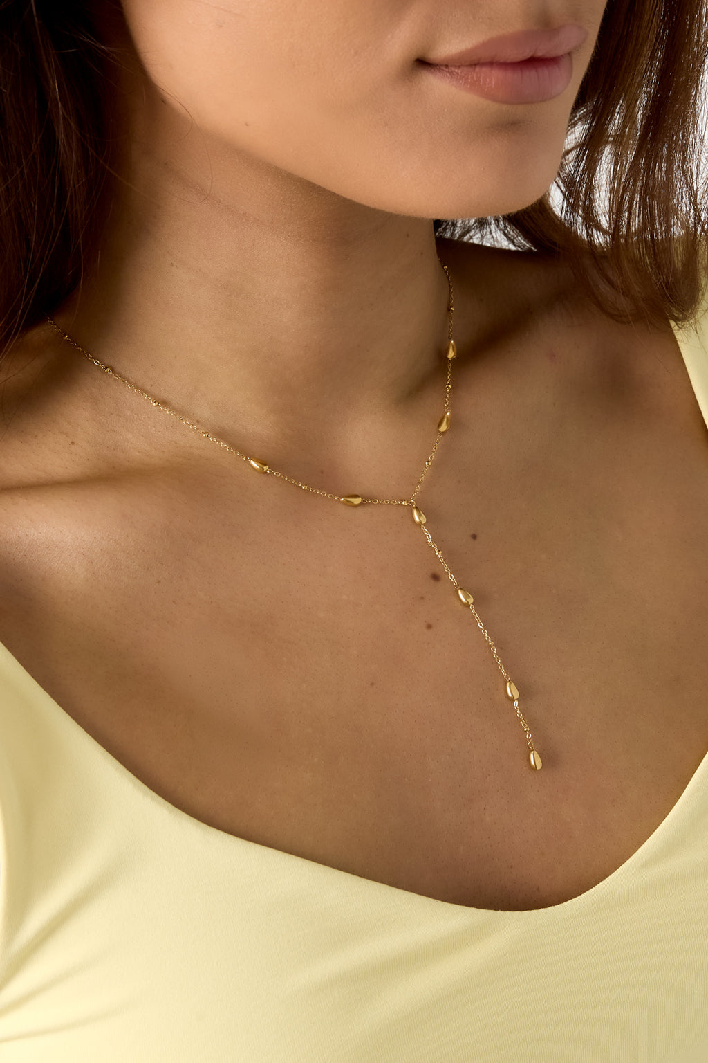 Yvonne - lange ketting Goud detail