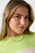 Dotty - schakelketting Goud aan hals