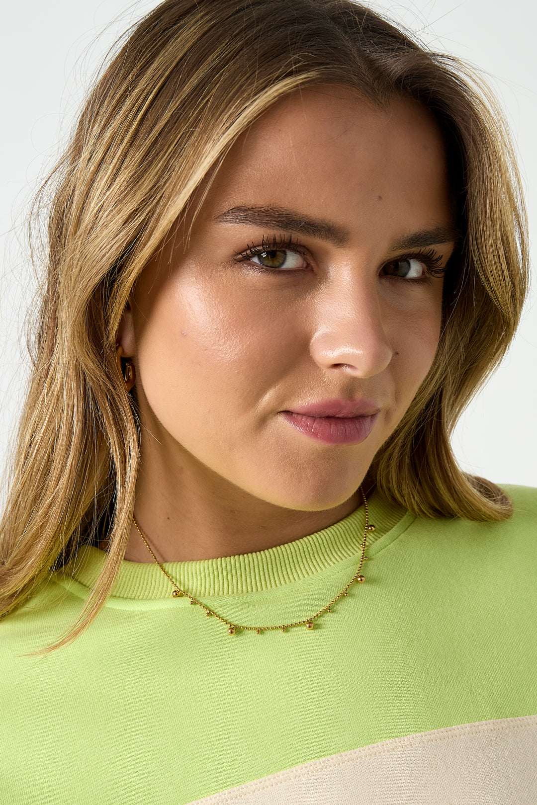 Dotty - schakelketting Goud aan hals