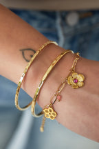 Vine - schakelarmband Goud aan pols