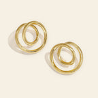 Swirl - Spiraal oorstekers goudkleur