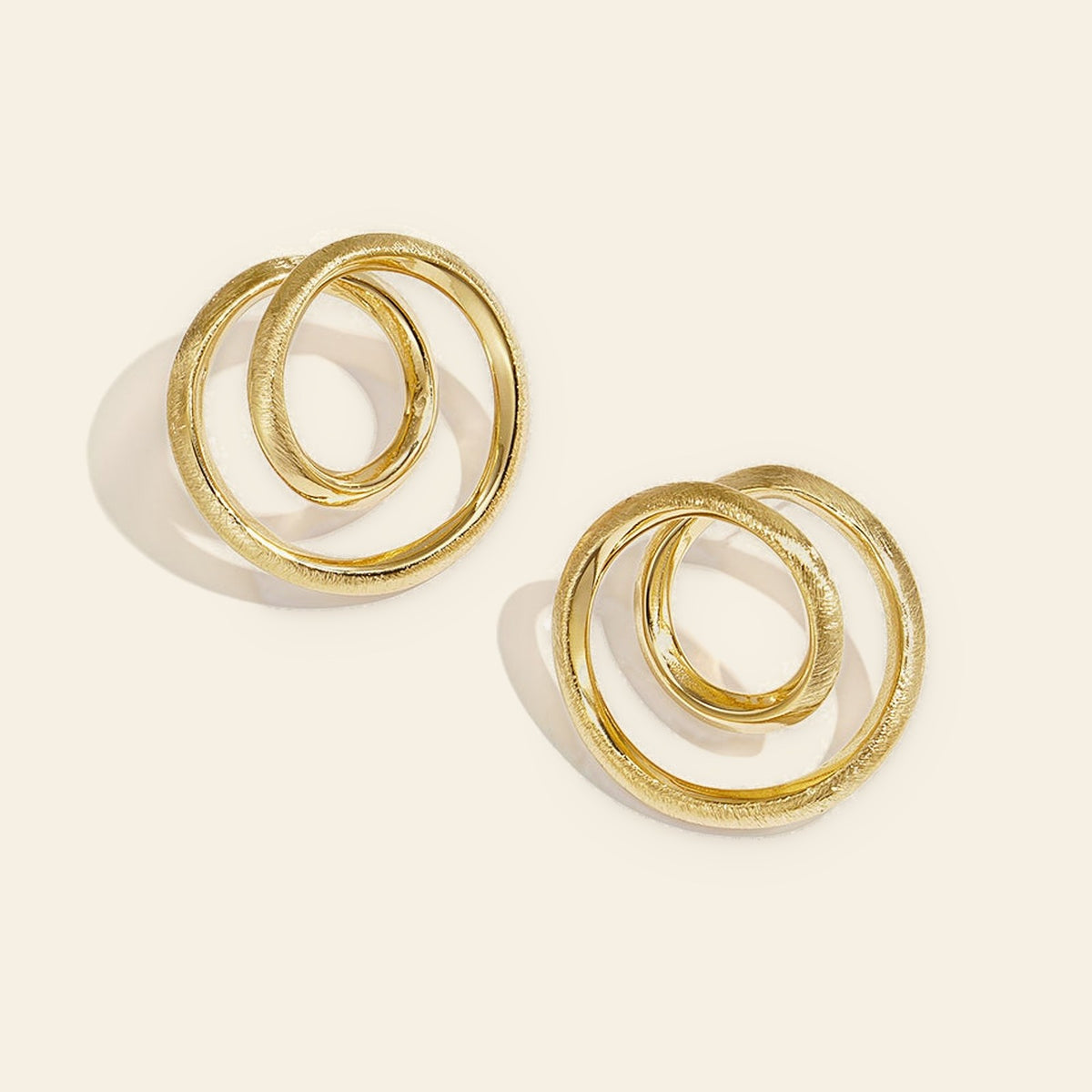 Swirl - Spiraal oorstekers goudkleur