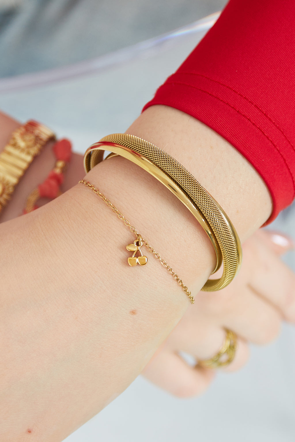 Cherry - kers armband Goud aan pols