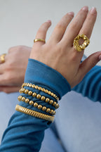 Goldie - schakelarmband Goud aan pols