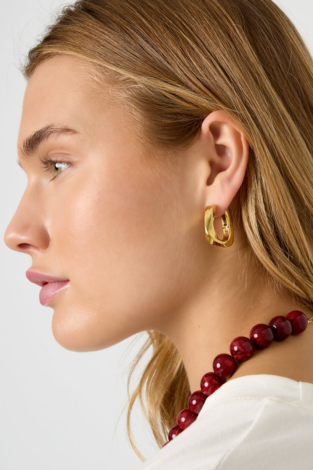 Twist - hoops Goud aan oor