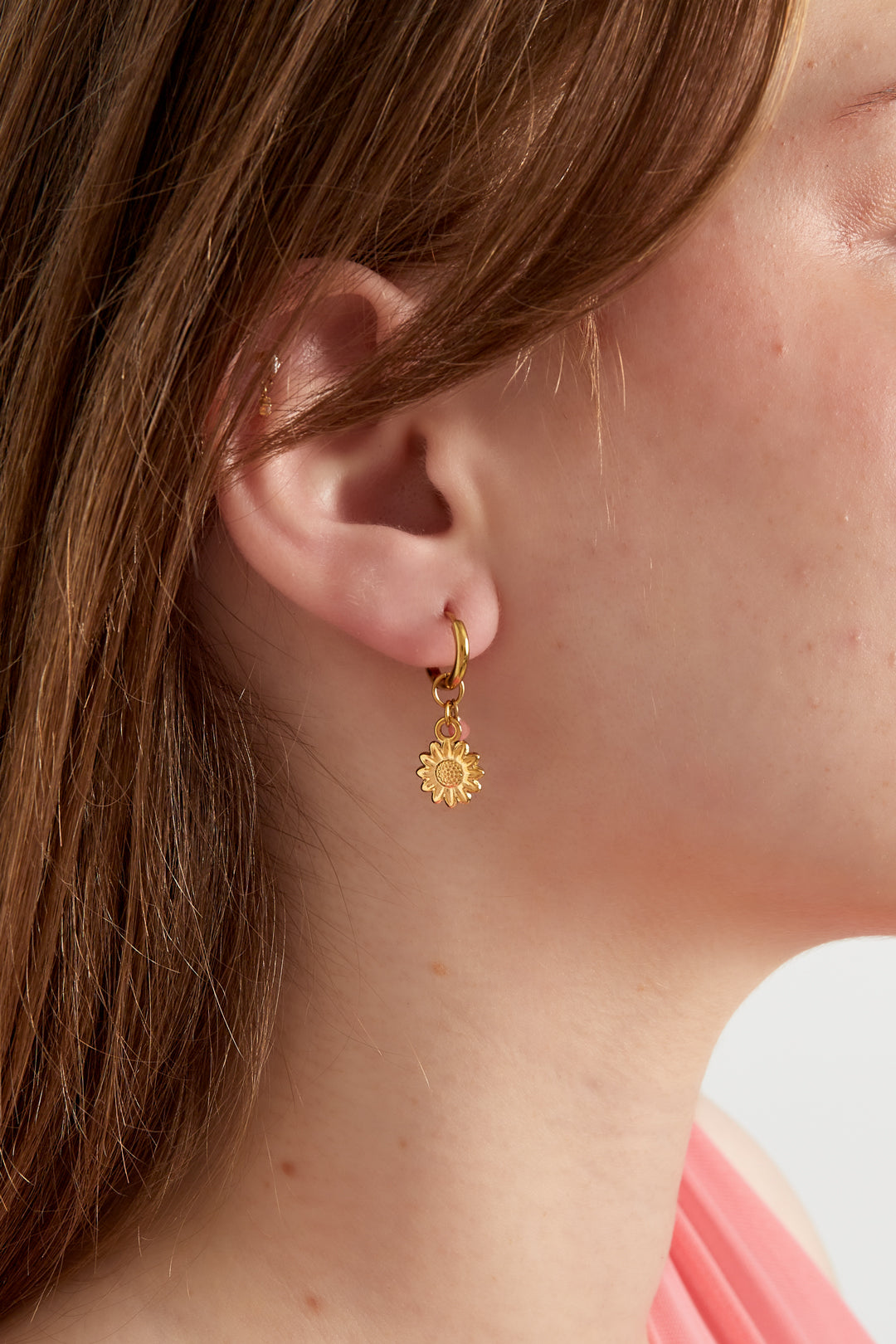 Rose - studs Roze aan oor