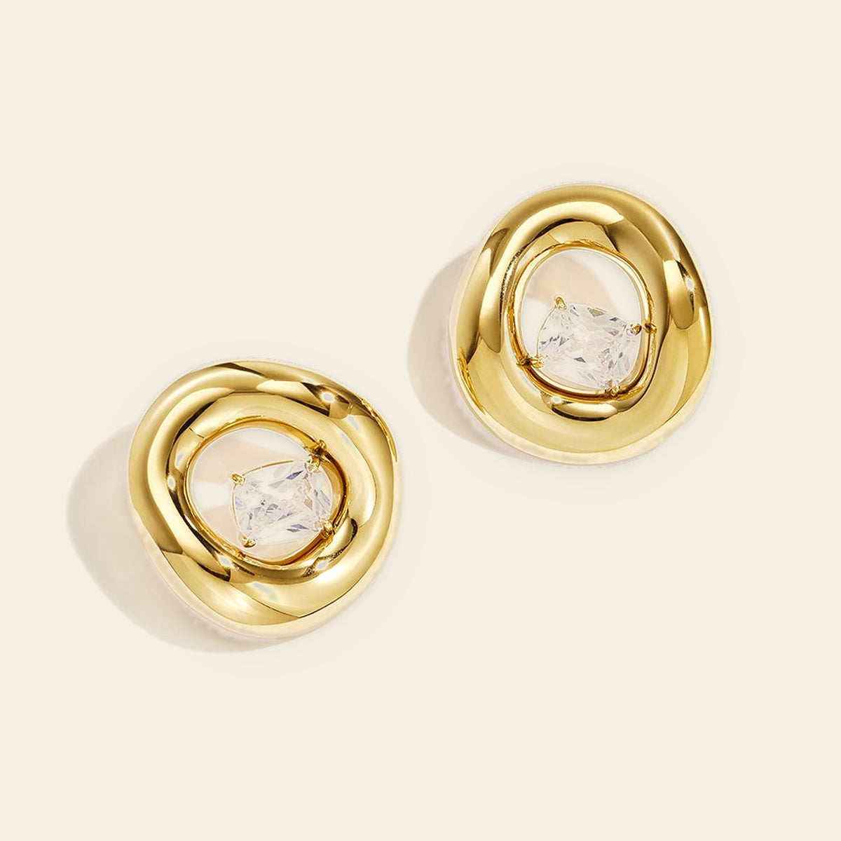 Reine - Oorstekers met zirkonia goudkleur