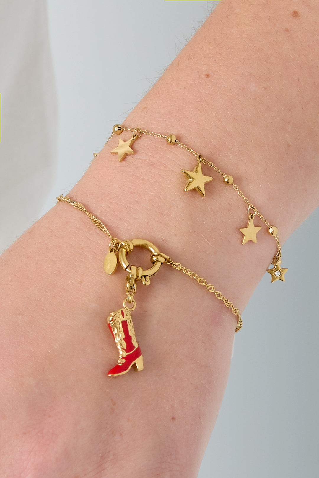 Stellar - bedelarmband Goud aan pols
