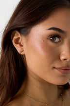 Bar - studs Goud aan oor