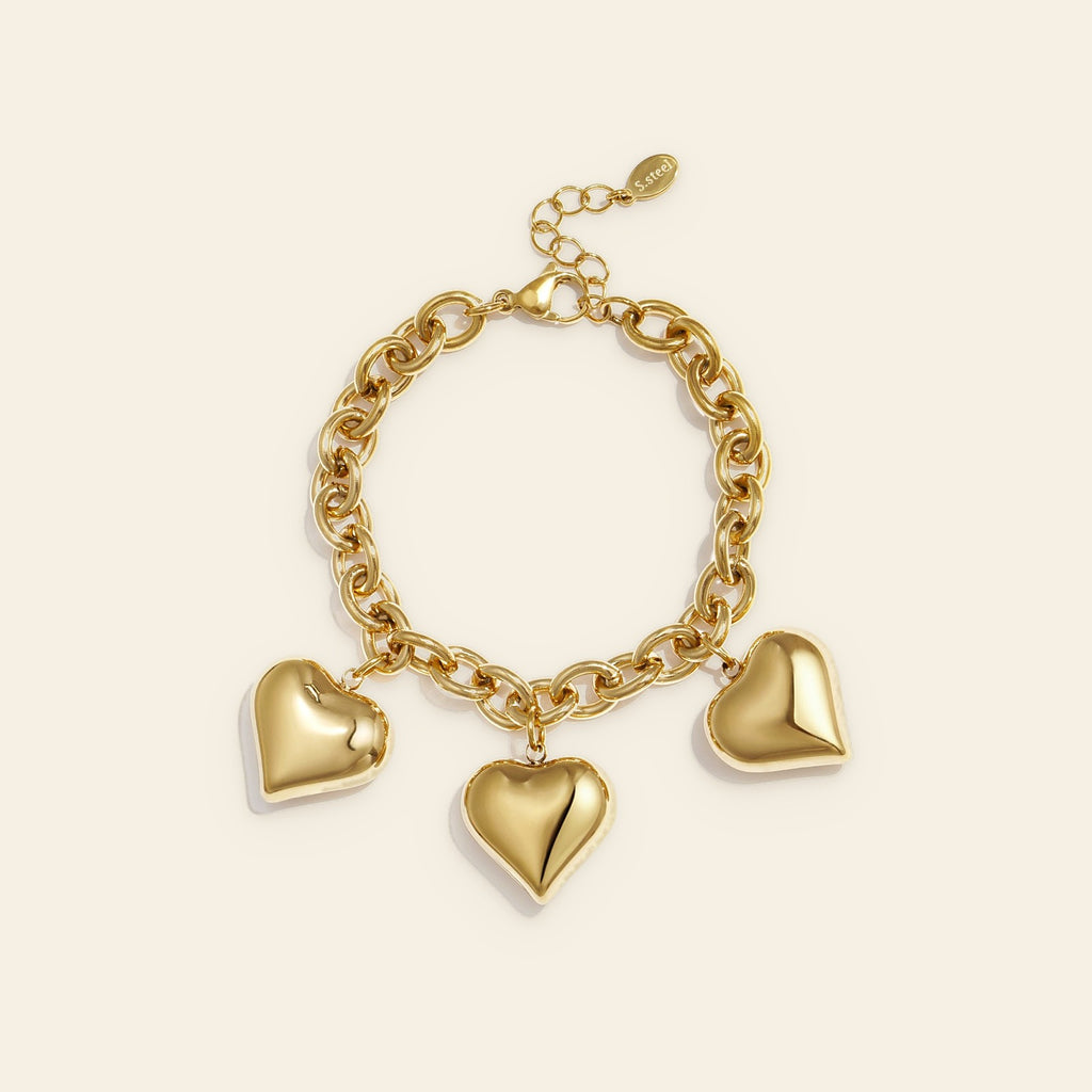 Amour - Hartjes schakelarmband goudkleur