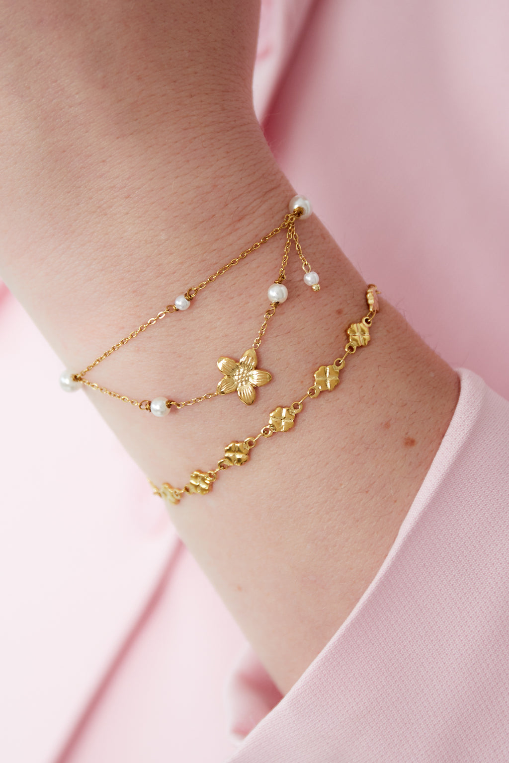 Fleurie - bedelarmband Goud aan pols