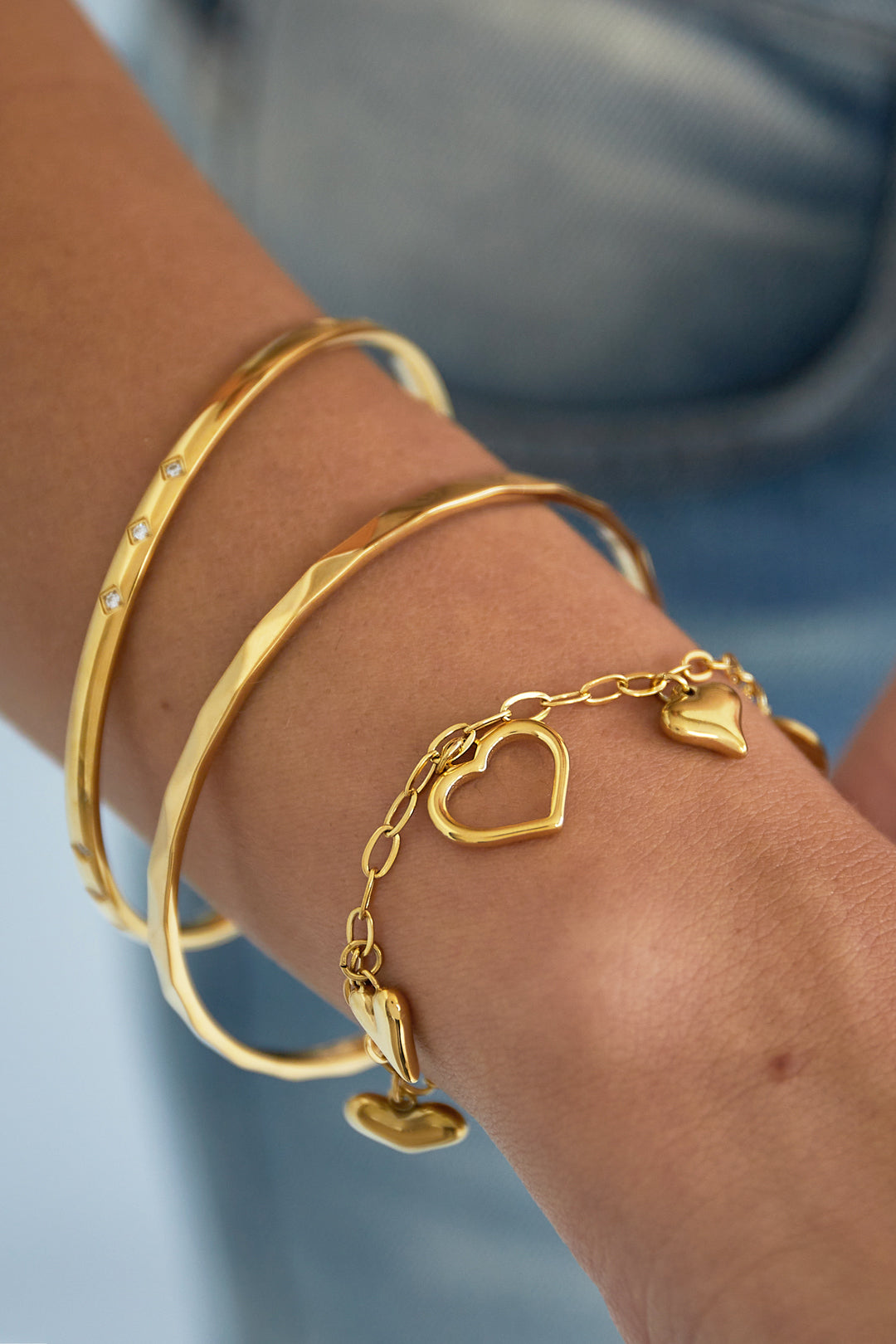 Edge - manchet armband Goud aan pols