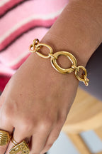 Mixed - schakelarmband Goud aan pols