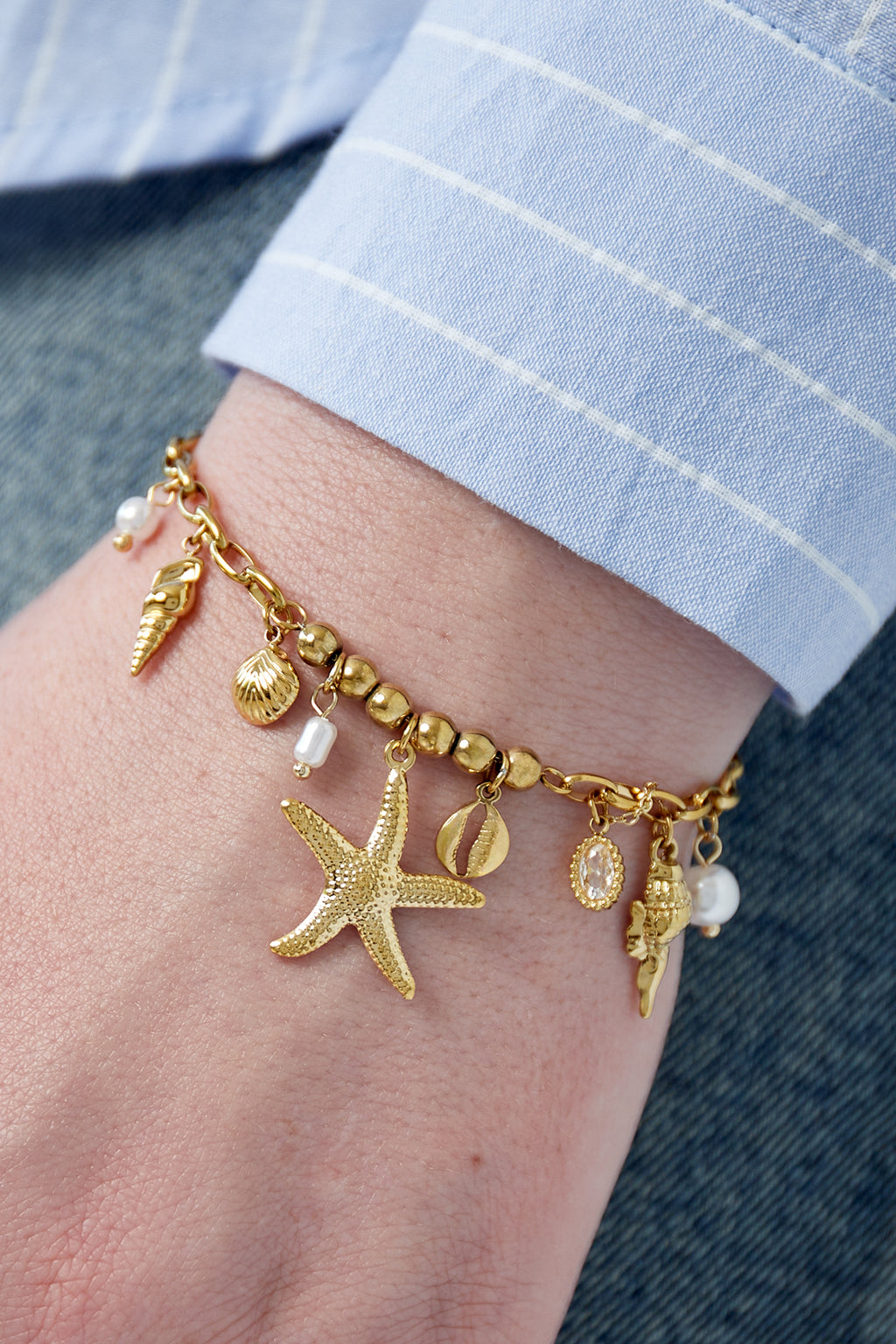 Solstice - bedelarmband Goud aan pols