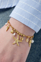 Solstice - bedelarmband Goud aan pols