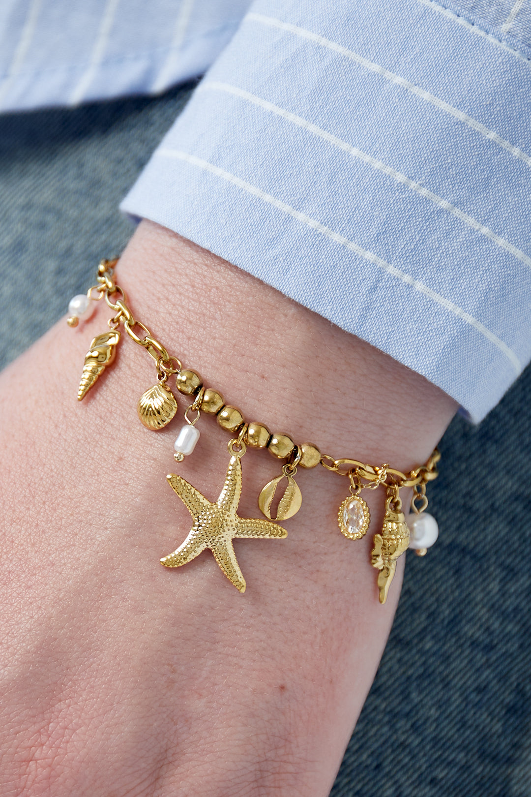 Solstice - bedelarmband Goud aan pols
